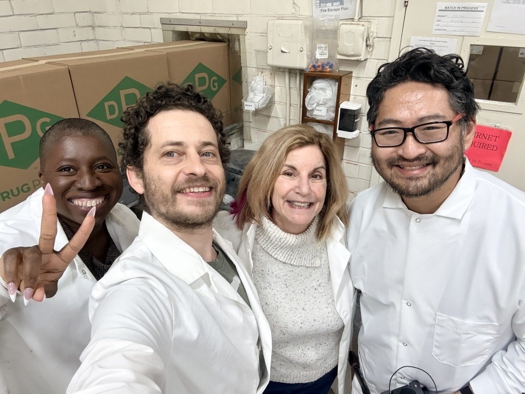 Team In Lab Coats & Hair Nets