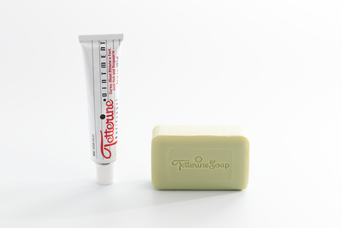 Tetterine White tube standing beside a Tetterine Soap bar